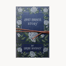 Book cover with floral design and text 'Janet Darney's Story by Sarah Doudney'