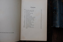 Table of contents page of an open book with a dark background