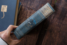 Book titled 'Stories of Bravery' with decorative cover on a wooden surface