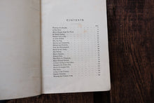 Table content page on wooden surface