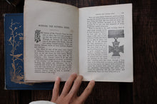 Open book with text and a small illustration