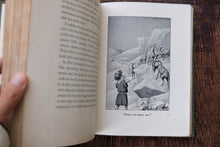 Open book with an illustration 